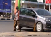 Tukang Parkir Viral Kerja Naik Brio, Netizen Saya Naiknya Beat