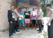 Polsek Tanjung Beringin Gelar Baksos, Bagikan Bantuan untuk Warga Kurang Mampu