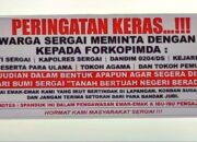 Spanduk Peringatan Keras Warga Sergai terhadap Maraknya Judi di Wilayah Polres Sergai
