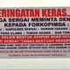 Spanduk Peringatan Keras Warga Sergai terhadap Maraknya Judi di Wilayah Polres Sergai