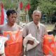 M. Holiluddin SE Ketua HNSI Sergai Berikan Bantuan Jaket Pelampung, Nelayan Terdampak Gelombang Laut