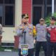 Apel Pagi, Kapolres Tebing Tinggi Serahkan Bingkisan Nataru