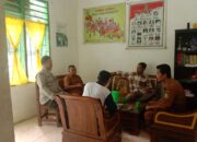 Polsek Sipispis Sampaikan Pesan Kamtibmas Saat Menyambangi Perangkat Desa