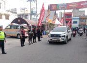 Petugas Pos Pam Pasar Kain Polres Tebing Tinggi Pastikan Kelancaran Lalu Lintas