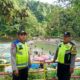 Petugas Pos Pam Bartong Polres Tebing Tinggi Pastikan Keamanan Wisatawan dalam Ops Ketupat Toba 2025