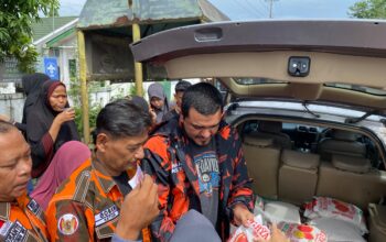 Pemuda Pancasila Sei Rampah Salurkan 100 Karung Beras untuk Warga Firdaus