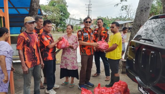 PAC Pemuda Pancasila Kec.Sei Rampah Salurkan Bantuan Sosial, Bukti Nyata Kepedulian Bersama Pengusaha Lokal.