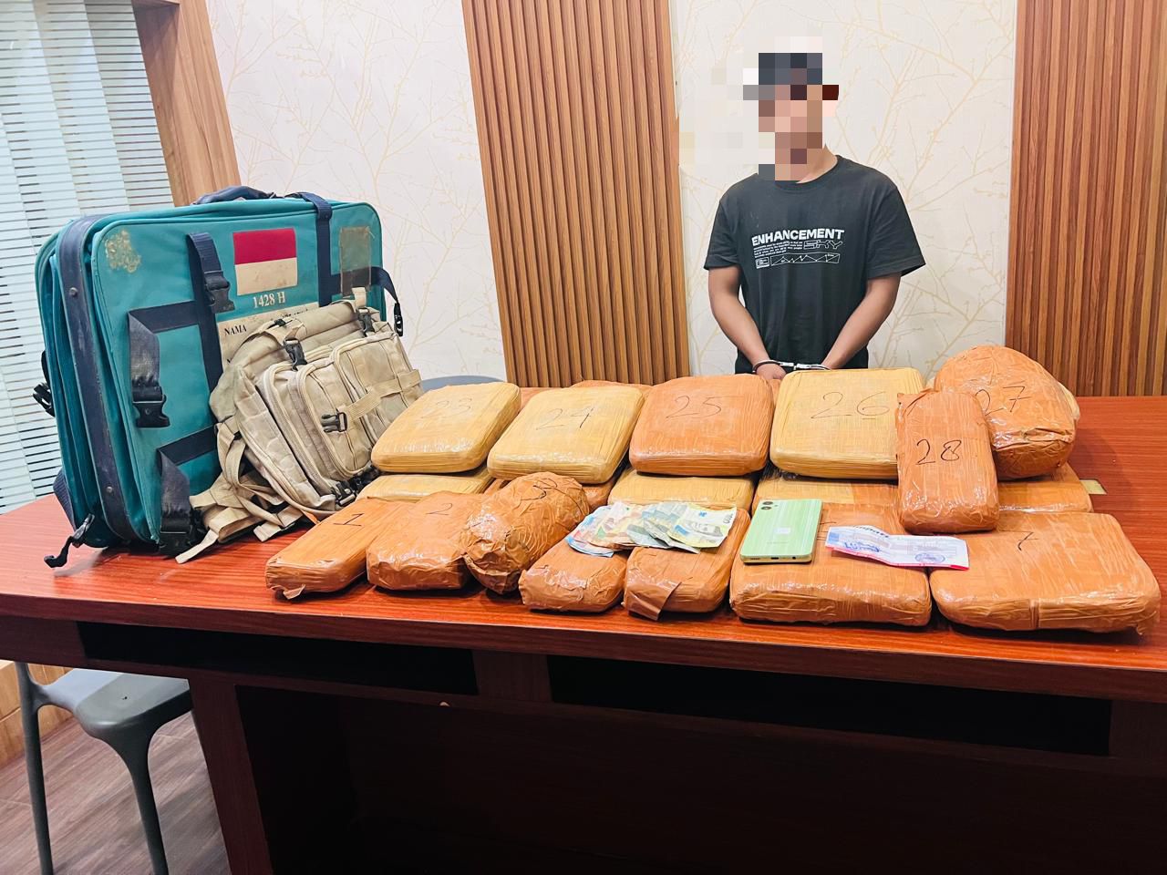 Polres Sergai Gagalkan Peredaran 24,6 Kg Ganja, Kurir Ditangkap Saat Naik Travel.