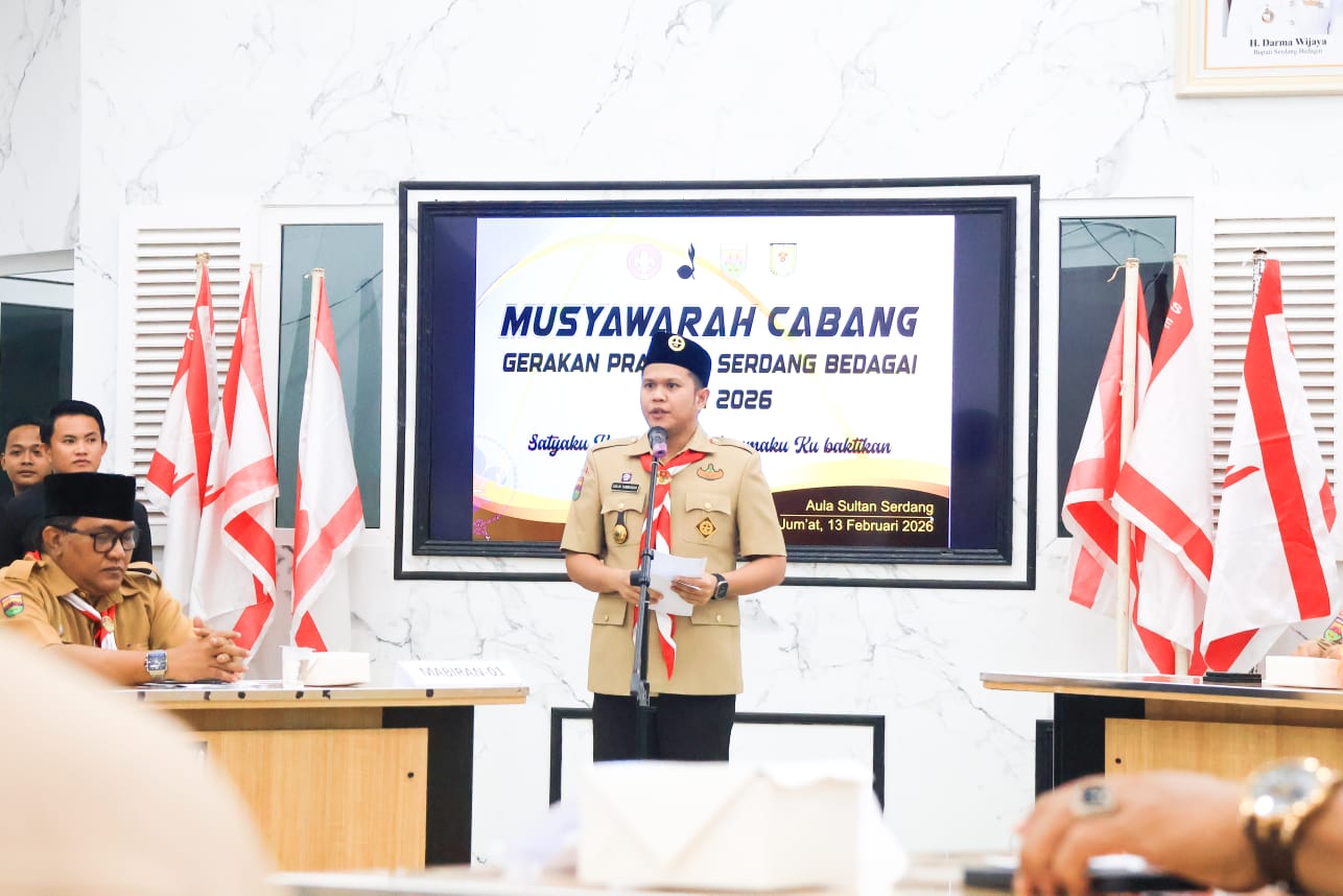 Wakil Bupati Sergai H Adlin Tambunan saat membuka Musyawarah Cabang (Muscab) Gerakan Pramuka Kabupaten Sergai Tahun 2026 di Aula Sultan Serdang Komplek Kantor Bupati Sergai di Sei Rampah, Jumat (13/2/2026).